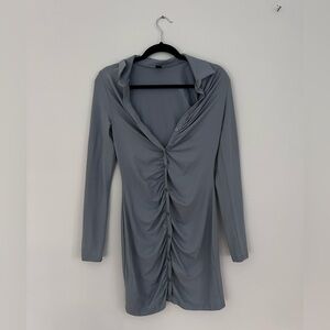 Long sleeve collared blue/gray dress with buttons.